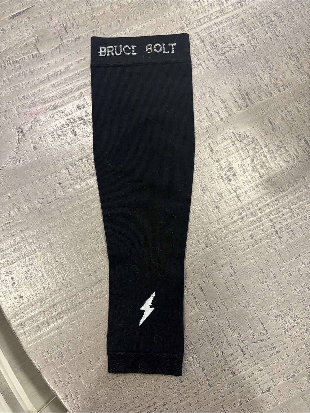 Bruce Bolt Black Athletic Compression Sleeve with White Bolt
